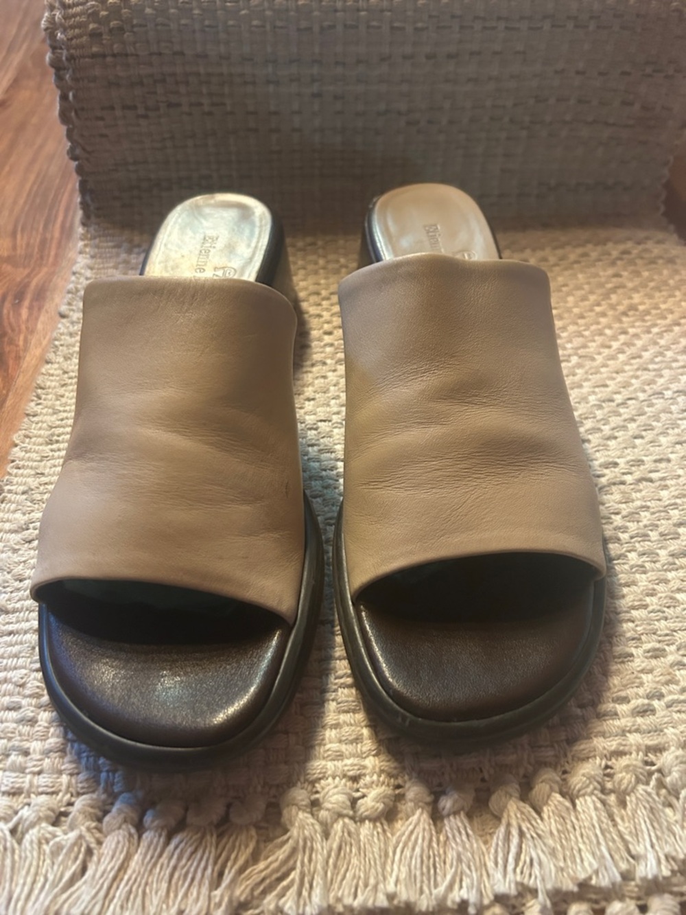 Etienne Aigner tan leather slides.